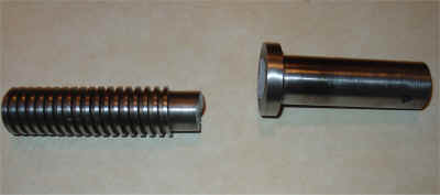 Broken infeed height adjustment screw.