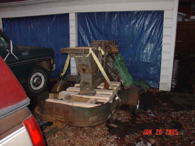 Jointer on trailer in driveway.